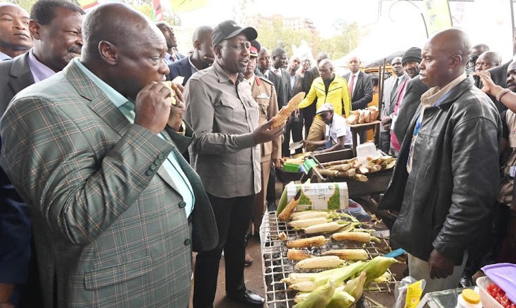 President William Ruto and his Dp Eating Mahindi Choma